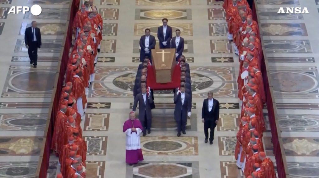 The coffin arrives in St. Peter's Square for the solemn funeral