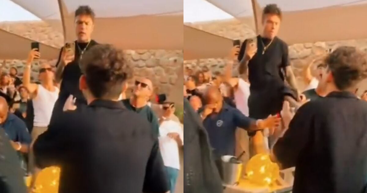 The rapper reacts by launching a kick